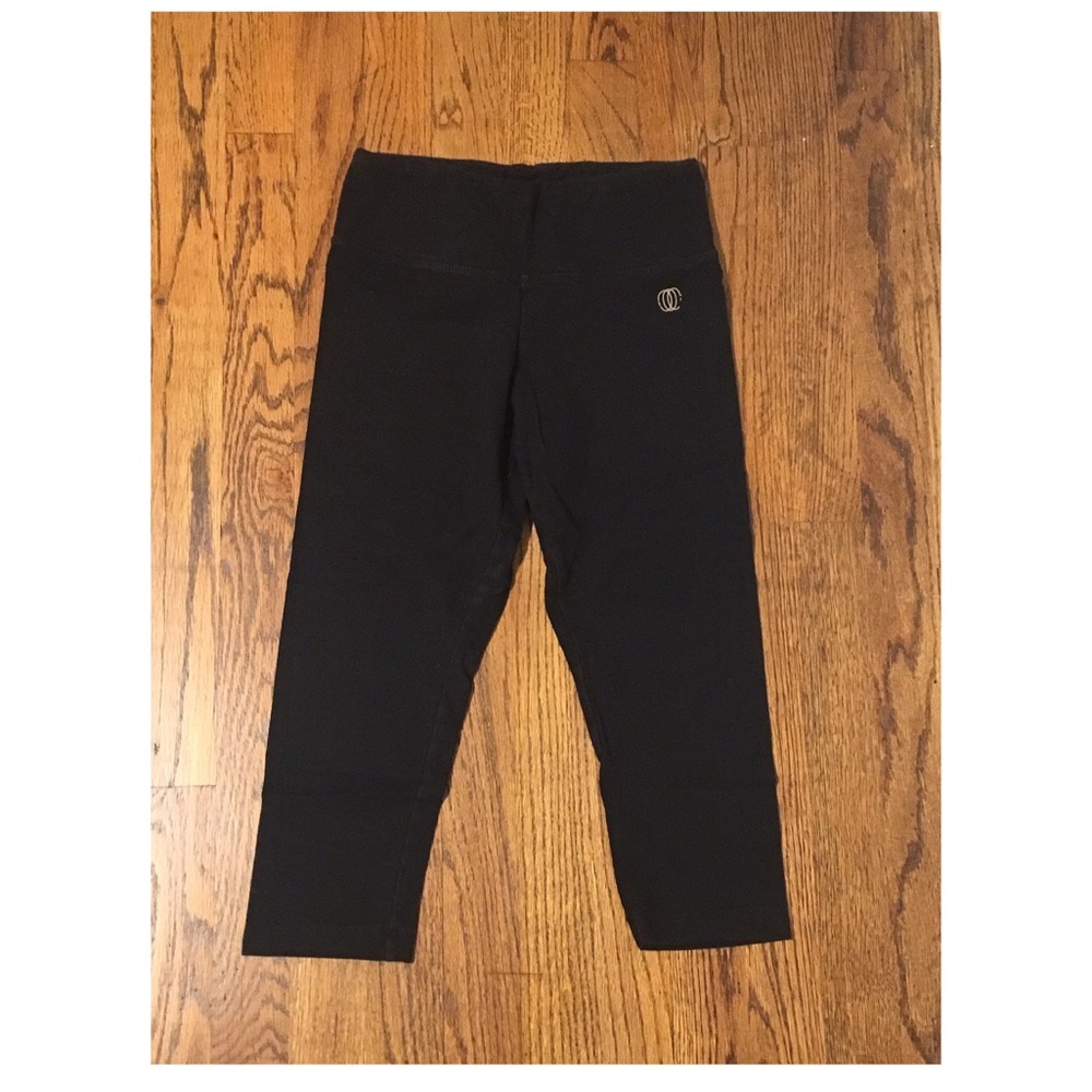 Black workout leggings with embroidered design